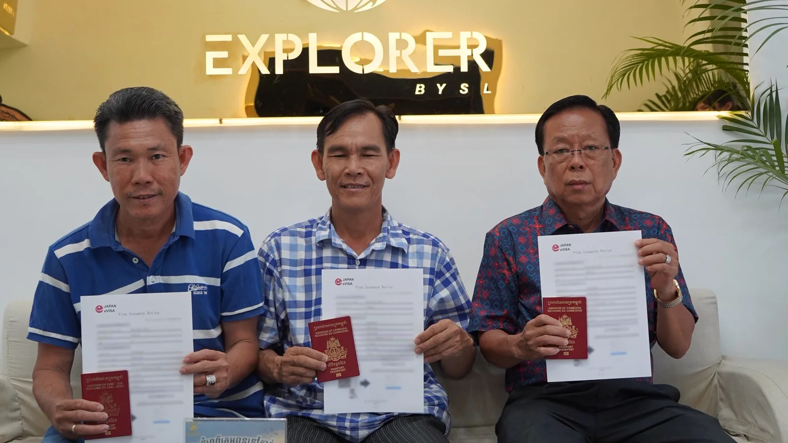 Clients celebrating approved travel documents